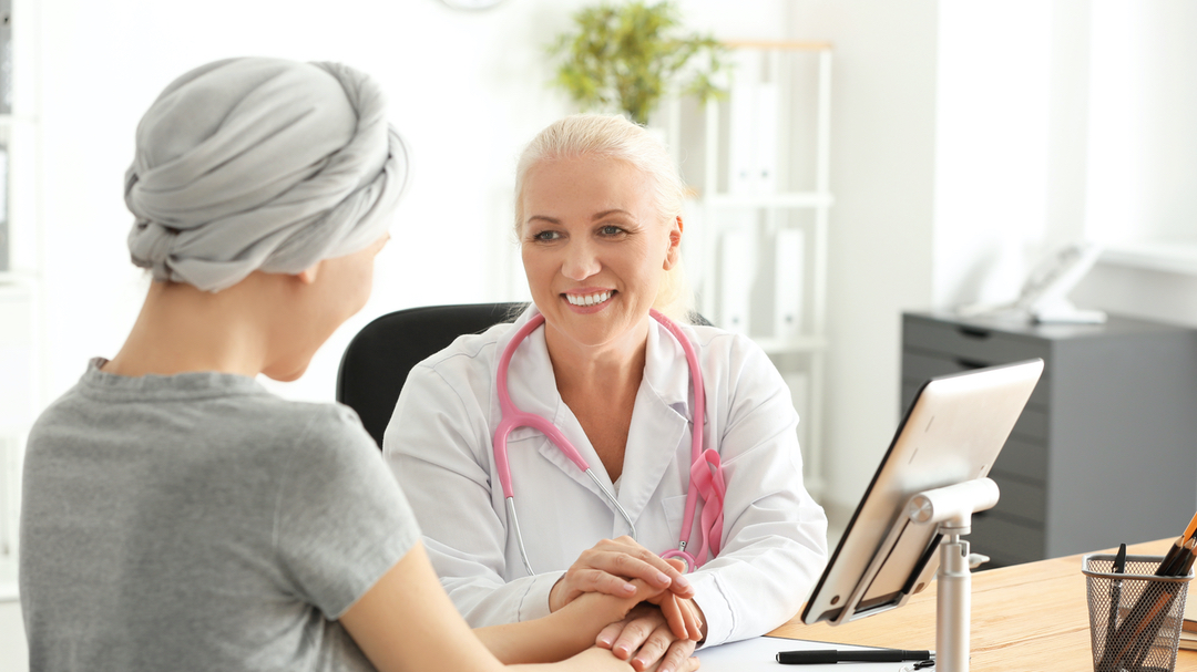 patient talking with doctor about a new approach for treating triple negative breast cancer